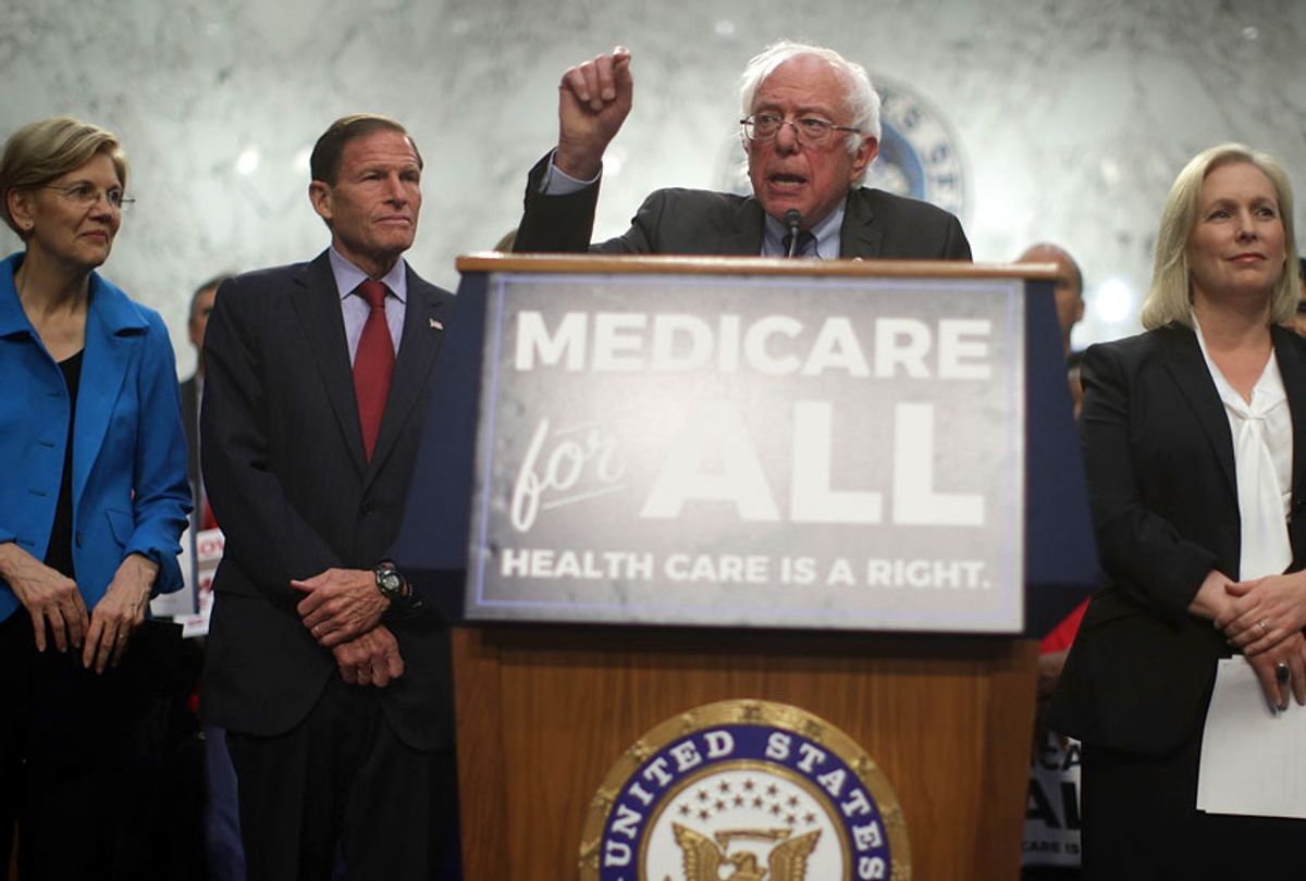 Sen. Bernie Sanders (I-VT) (3rd L) speaks on health care as (L-R) Sen. Elizabeth Warren (D-MA), Sen. Richard Blumenthal (D-CT) and Sen. Kirsten Gillibrand (D-NY) listen during an event September 13, 2017 on Capitol Hill in Washington, DC. (Getty/Alex Wong)