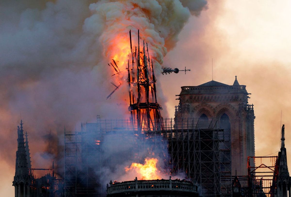 The steeple collapses as smoke and flames engulf the Notre-Dame Cathedral in Paris on April 15, 2019.  (Getty/Geoffroy Van Der Hasselt)