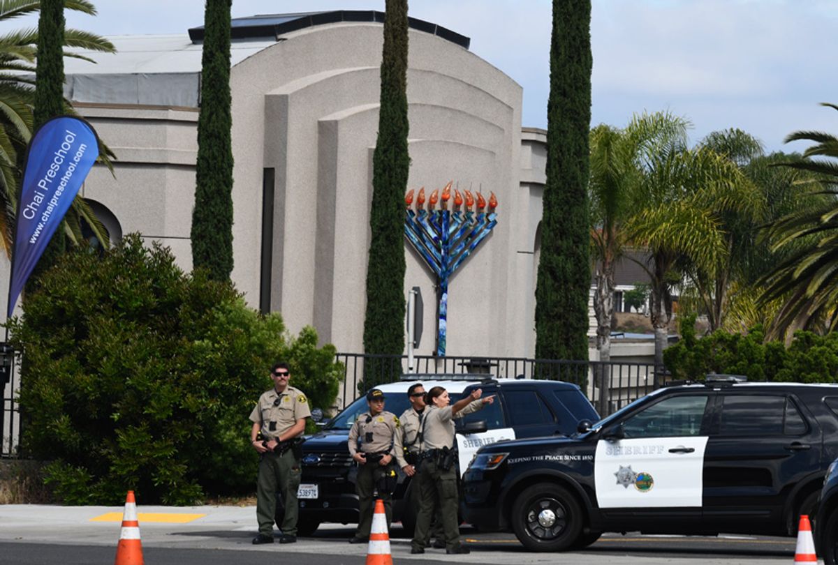 San Diego county sheriff deputies stand in front of the Chabad of Poway synagogue, Sunday, April 28, 2019, in Poway, Calif. A man opened fire Saturday inside the synagogue near San Diego as worshippers celebrated the last day of a major Jewish holiday. (AP Photo/Denis Poroy) ((AP Photo/Denis Poroy))