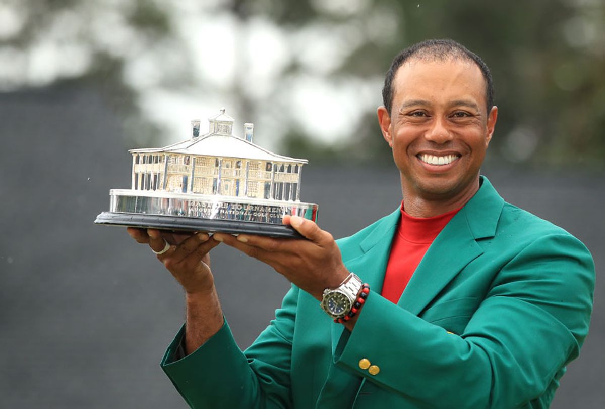 Tiger Woods of the United States celebrates with the Masters Trophy during the Green Jacket Ceremony after winning the Masters at Augusta National Golf Club on April 14, 2019 in Augusta, Georgia. (Getty/Andrew Redington)