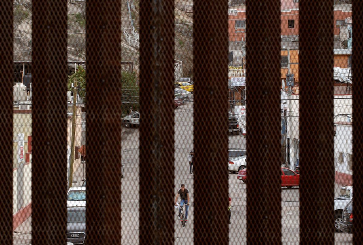 Nogales, Mexico, is framed by slats in a border wall that separates it from Nogales, Ariz., Saturday, March 2, 2019. (AP/Charlie Riedel)