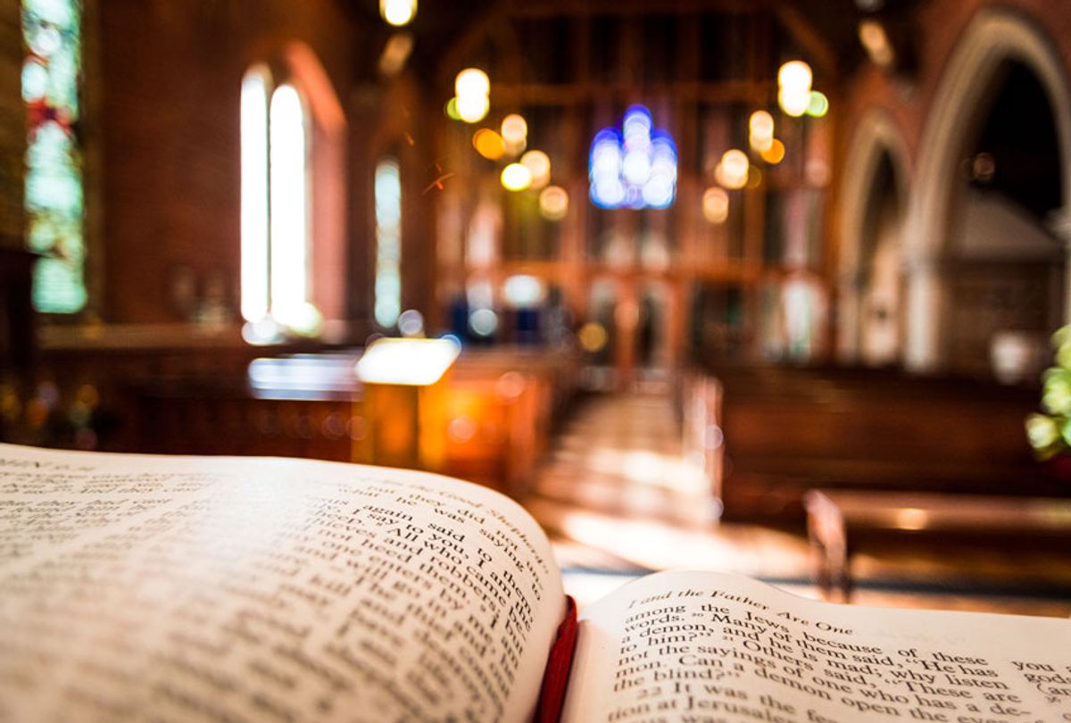 Open bible in church (Getty/coldsnowstorm)