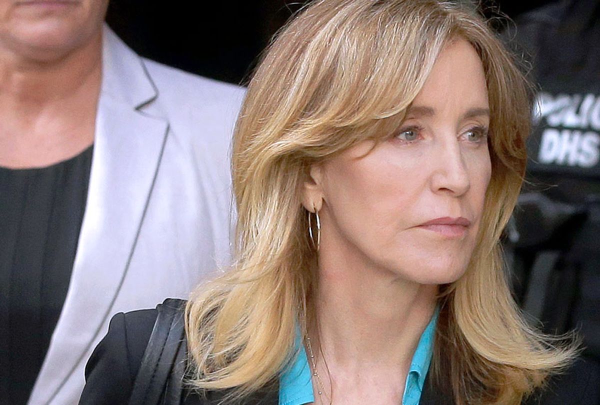 Actress Felicity Huffman arrives at federal court in Boston to face charges in a nationwide college admissions bribery scandal, April 3, 2019. (AP/Steven Senne)