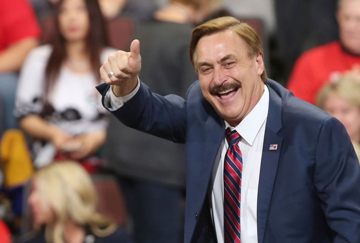 Mike Lindell, inventor and founder of My Pillow, gives a thumbs up before a rally address by President Donald Trump Thursday, Oct. 4, 2018, in Rochester, MN. (AP/Jim Mone)