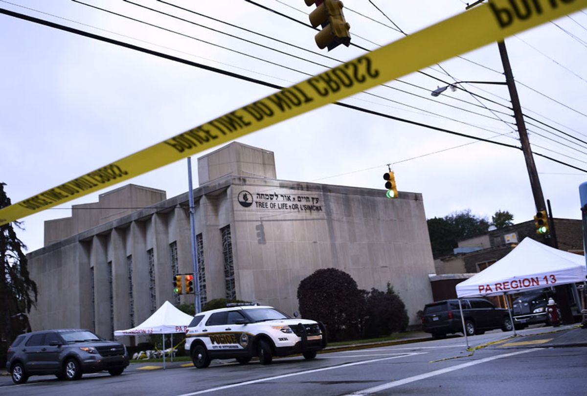 Police tape is viewed around the area on October 28, 2018 outside the Tree of Life Synagogue after a shooting there left 11 people dead in the Squirrel Hill neighborhood of Pittsburgh on October 27, 2018. (Getty/Brendan Smialowski)