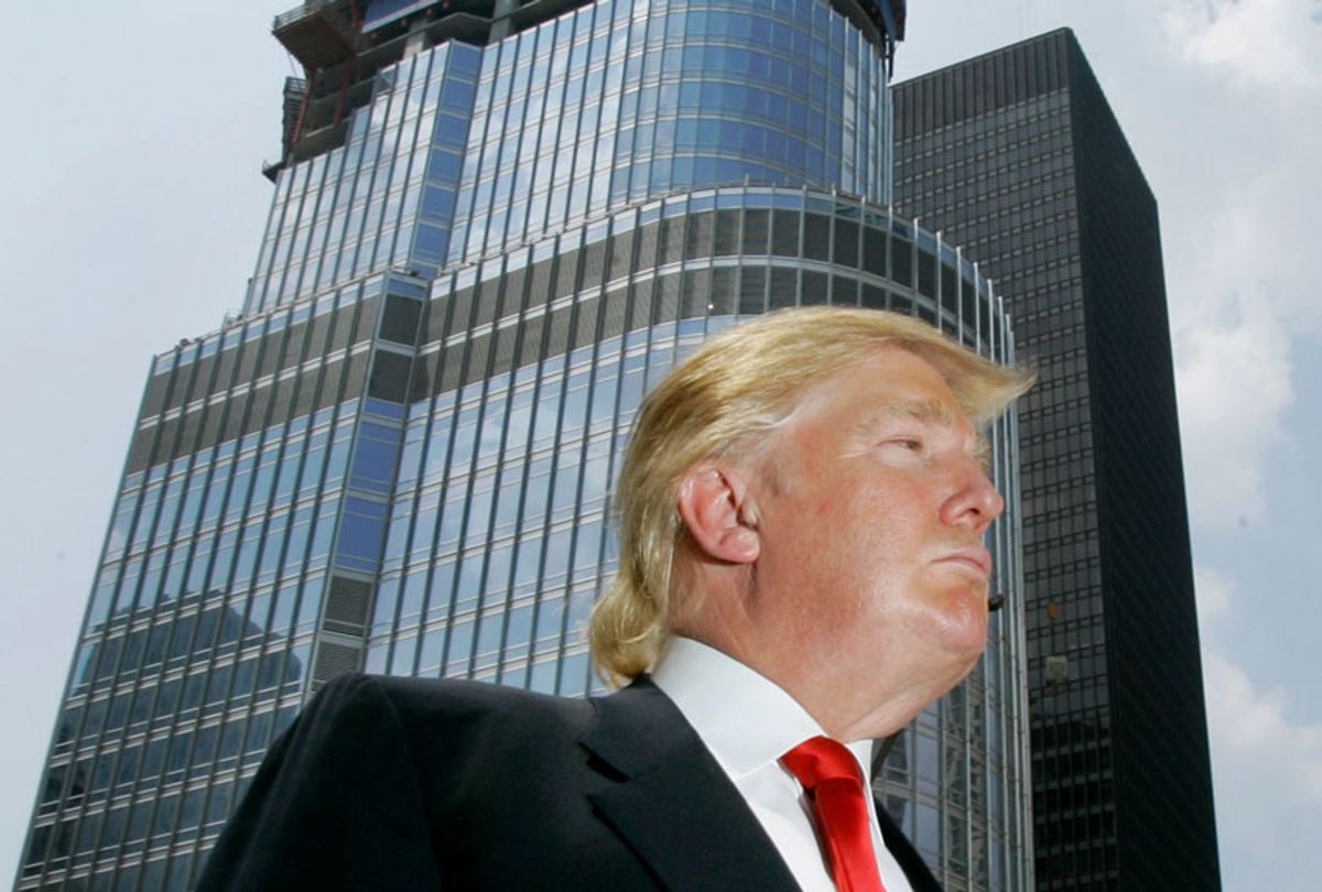 Donald Trump is profiled against his Trump International Hotel & Tower in Chicago.  (AP/Charles Rex Arbogast)