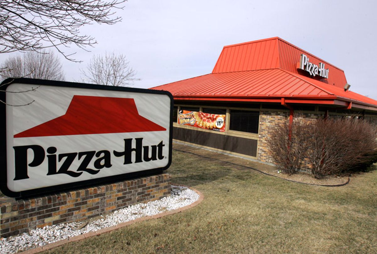 people eating pizza hut