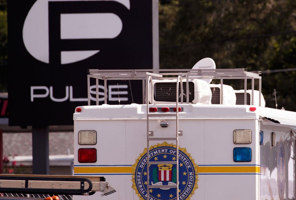 A vehicle belonging the Federal Bureau of Investigation (FBI) is parked at the crime scene at Pulse Nightclub on Orange Avenue, June 15, 2016 in Orlando, Florida. (Getty/Drew Angerer)