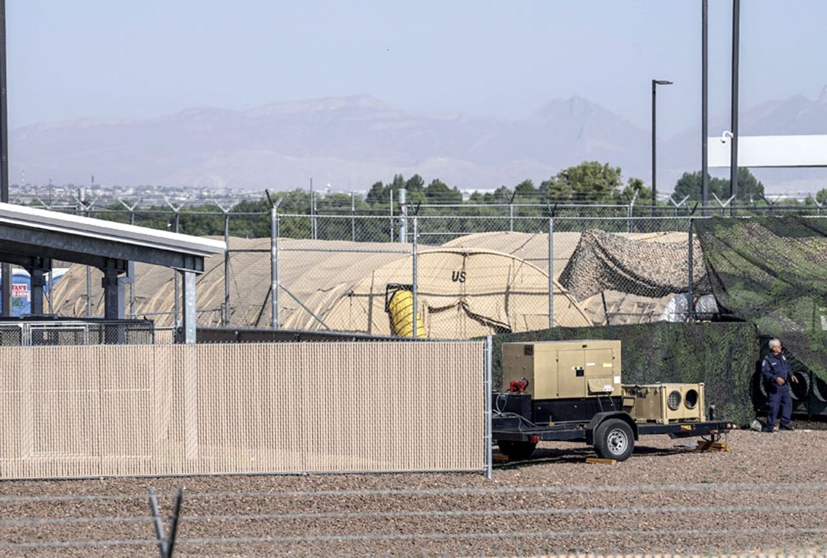 Military tents used to house migrants are pictured at the US Customs and Border Protection facility is seen in Clint, Texas, on June 26, 2019. - The site held about 250 children in crowded cells, with limited sanitation and medical attention, as reported by a group of lawyers able to tour the facility under the Flores Settlement.  (Getty/Paul Ratje)