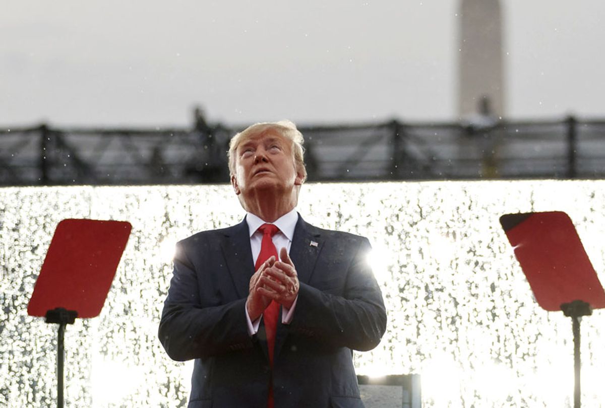 President Donald Trump looks up during the military flyovers at the Independence Day celebration in front of the Lincoln Memorial, Thursday, July 4, 2019, in Washington.  (AP/Carolyn Kaster)