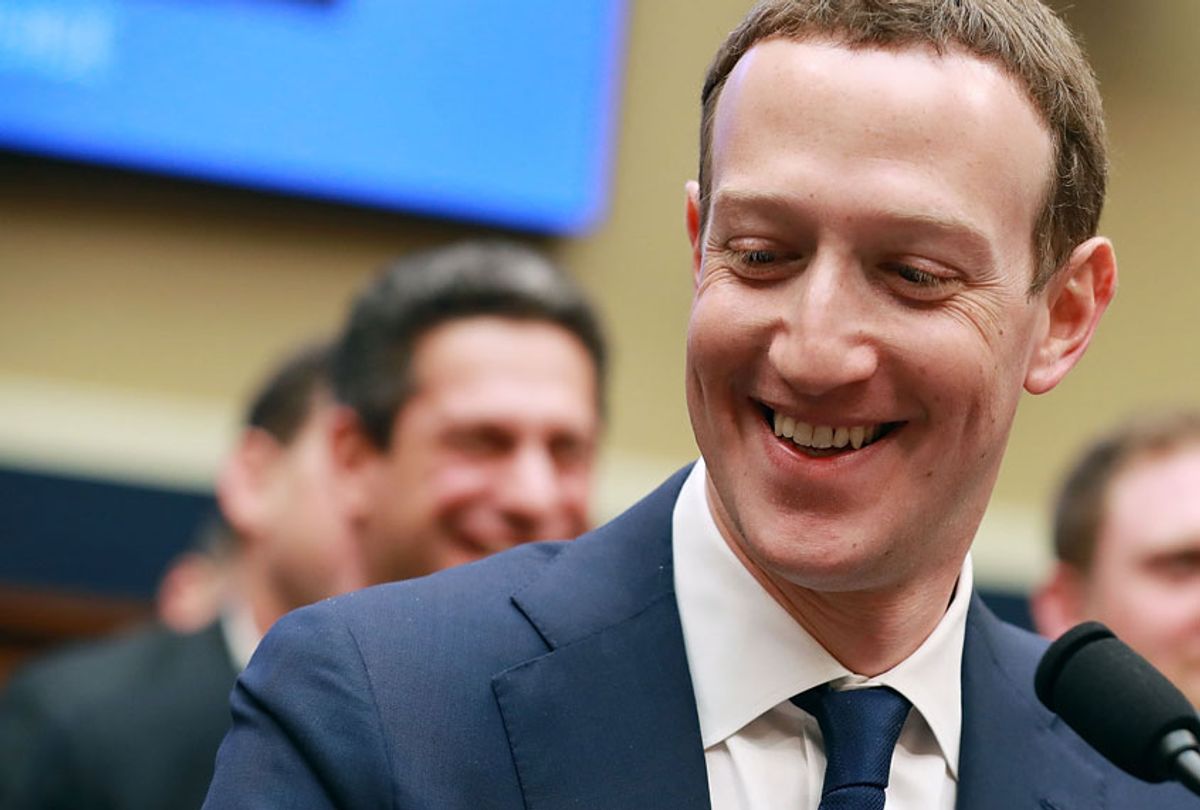 Facebook co-founder, Chairman and CEO Mark Zuckerberg smiles at the conclusion of his testimony before the House Energy and Commerce Committee in the Rayburn House Office Building on Capitol Hill April 11, 2018 in Washington, DC.  (Getty/Chip Somodevilla)