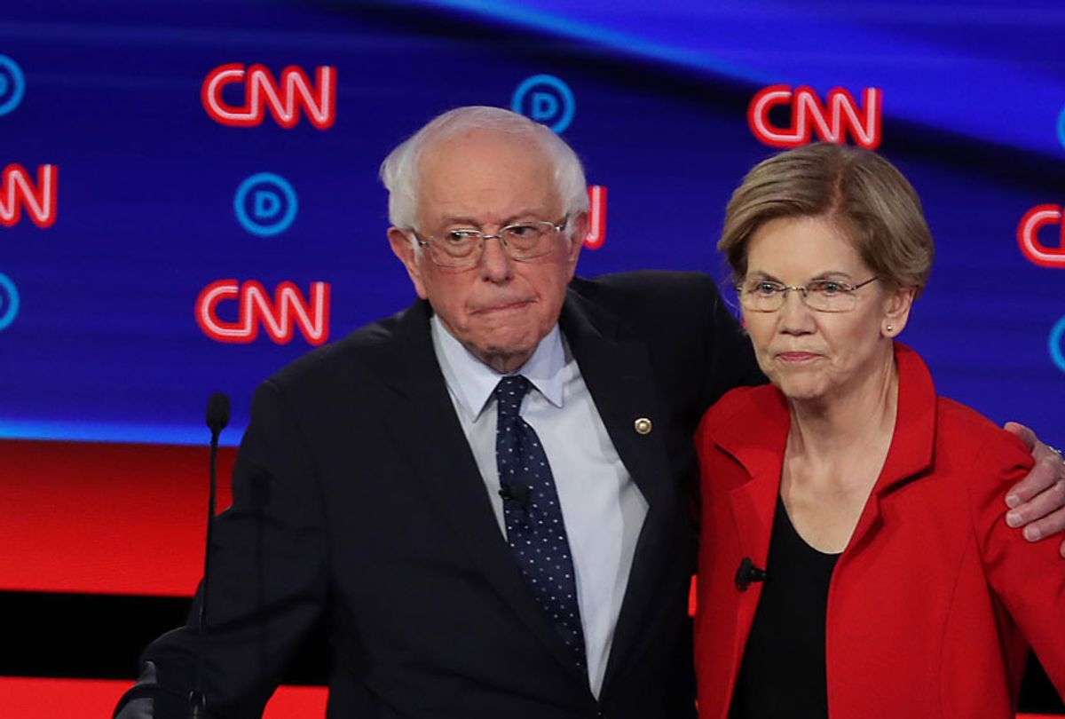 Democratic presidential candidate Sen. Bernie Sanders (I-VT) (L) and Sen. Elizabeth Warren (D-MA) embrace after the Democratic Presidential Debate at the Fox Theatre July 30, 2019 in Detroit, Michigan. (Getty/Justin Sullivan)