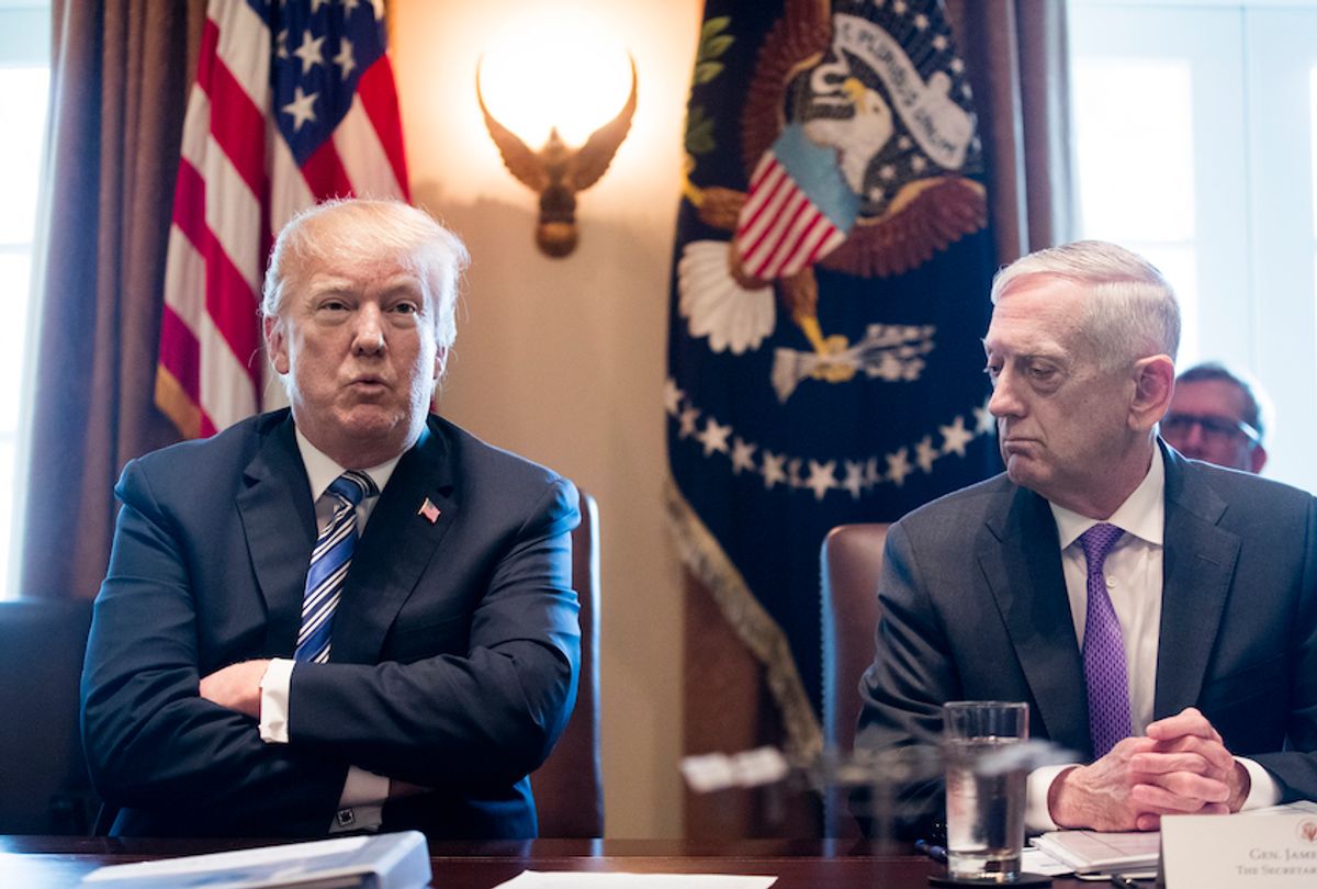 U.S. President Donald J. Trump (L) speaks beside US Secretary of Defense Jim Mattis (R) during a meeting with members of his Cabinet, in the Cabinet Room of the White House March 8, 2018 in Washington, DC. (Michael Reynolds-Pool/Getty Images)