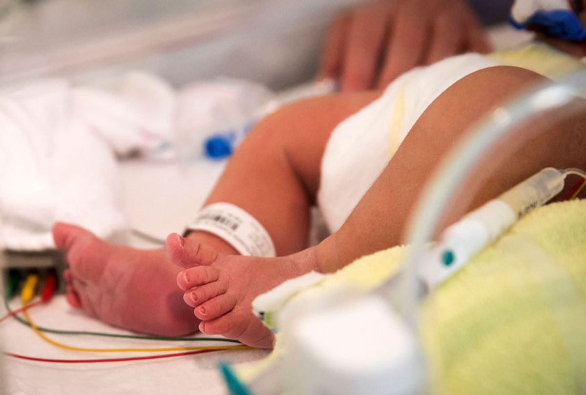 A baby in a hospital bed (Getty/AFP Contributor)