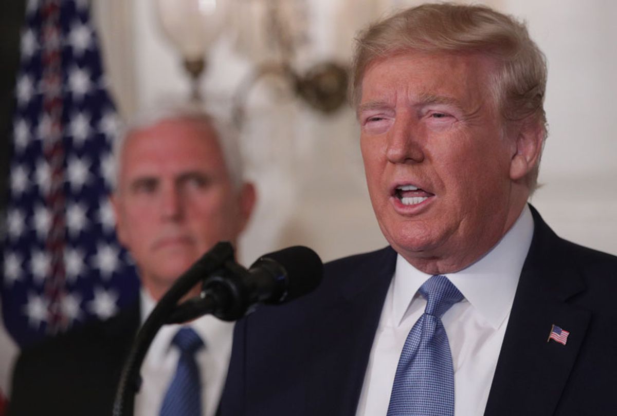 President Donald Trump makes remarks in the Diplomatic Reception Room of the White House as Vice President Mike Pence looks on August 5, 2019 in Washington, DC. President Trump delivered remarks on the mass shootings in El Paso, Texas, and Dayton, Ohio, over the weekend.  (Getty/Alex Wong)