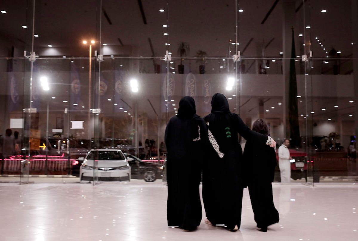 FILE - In this June 21, 2018 file photo, women leave after looking at cars at the Al-Jazirah Ford showroom in Riyadh, Saudi Arabia. Ride-hailing companies Uber and local competitor Careem are hiring female drivers after Saudi Arabia lifted a longstanding ban on women driving. (AP Photo/Nariman El-Mofty, File) (AP Photo/Nariman El-Mofty, File)