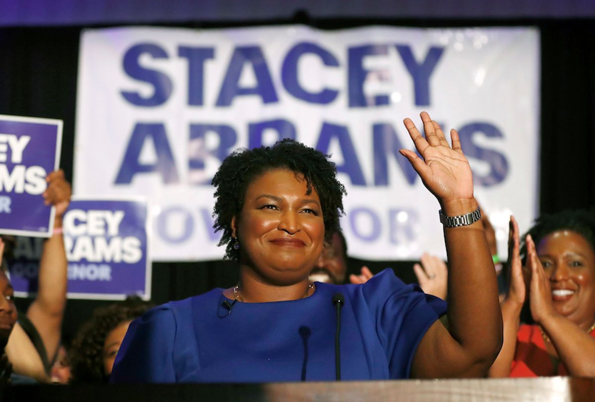 FILE- In this May 22, 2018 file photo Democratic candidate for Georgia Gov. Stacey Abrams waves in Atlanta. Former Vice President Joe Biden is endorsing Abrams Wednesday, June 20, 2018.  (AP Photo/John Bazemore)