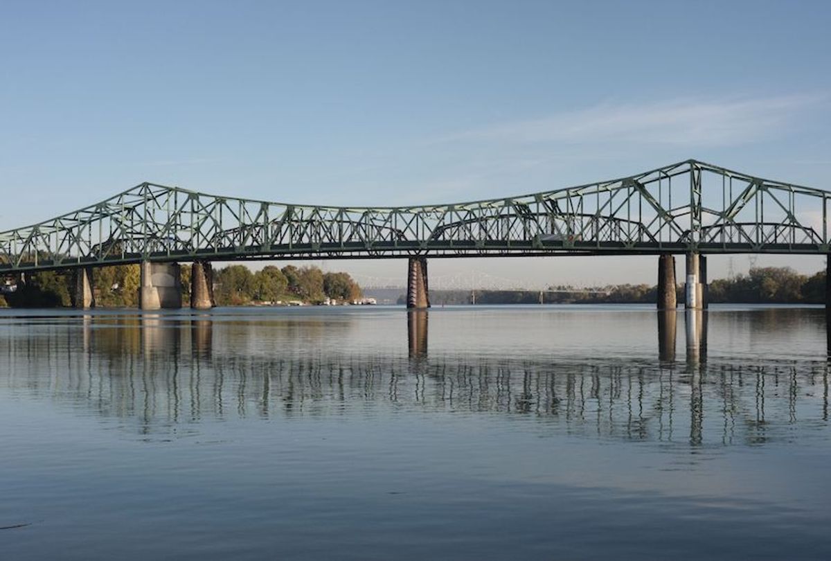 Bridges spanning across the Ohio River are seen between West Virginia and Ohio, seen from Parkersburg, West Virginia on October 27, 2017.
US President Donald Trump may not be short of critics in Washington, DC but supporters in the US heartland who helped propel Donald Trump to the White House say his tumultous presidency is a welcome break from business as usual and is already delivering on his pledge to reverse their declining fortunes.  / AFP PHOTO / Ivan Couronne        (Photo credit should read IVAN COURONNE/AFP/Getty Images) (Ivan Couronne/Afp/Getty Images)