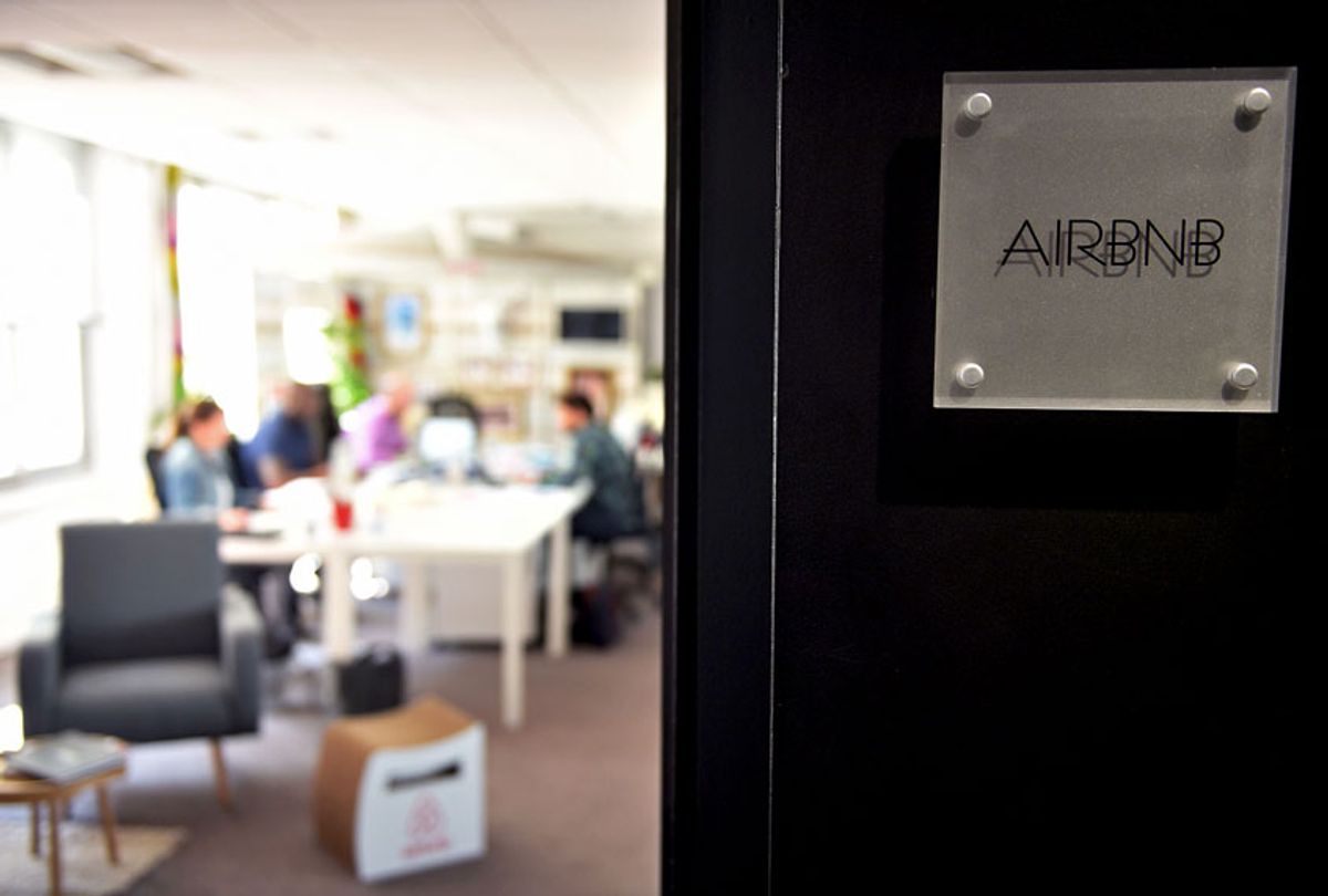 A picture shows a plaque at the entrance of the offices of online lodging service Airbnb in Paris on April 21, 2015. (MARTIN BUREAU/AFP/Getty Images)