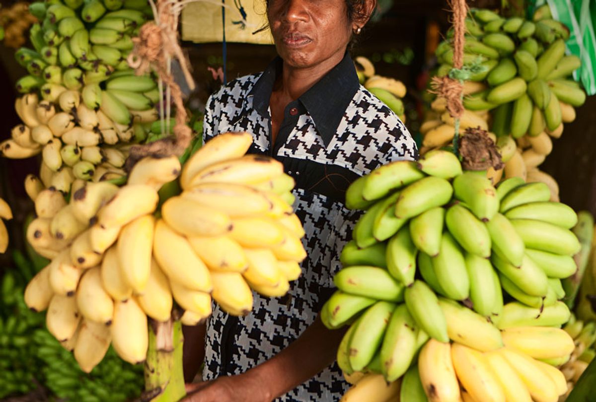 Banana seller in his shop (Getty Images/ Bartosz Hadyniak)
