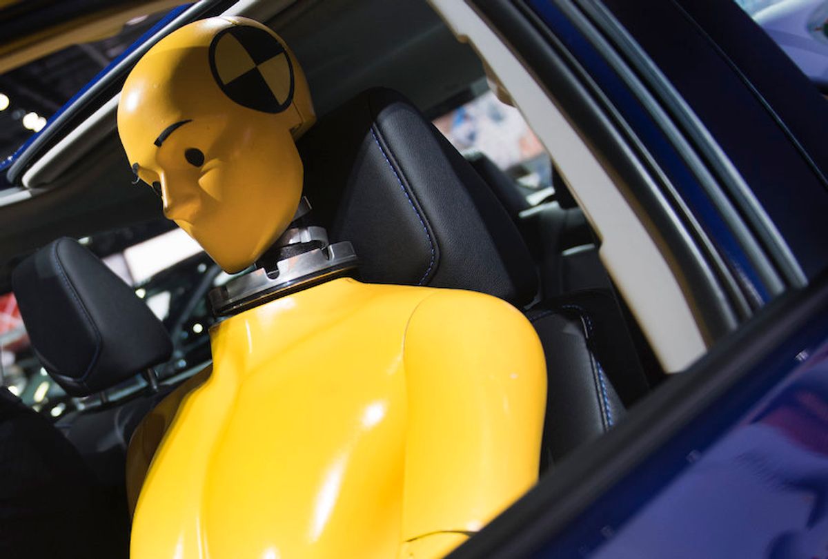 A crash test dummy sits inside a Toyota Coralla as it is shown during the 2017 North American International Auto Show in Detroit, Michigan, January 10, 2017. (Jim Watson/AFP/Getty Images)