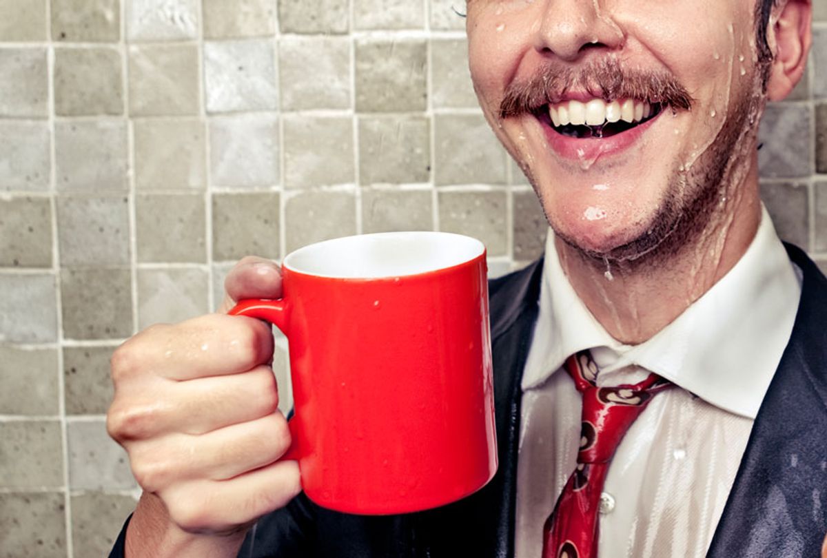 Man having coffee in the shower (Getty Images)