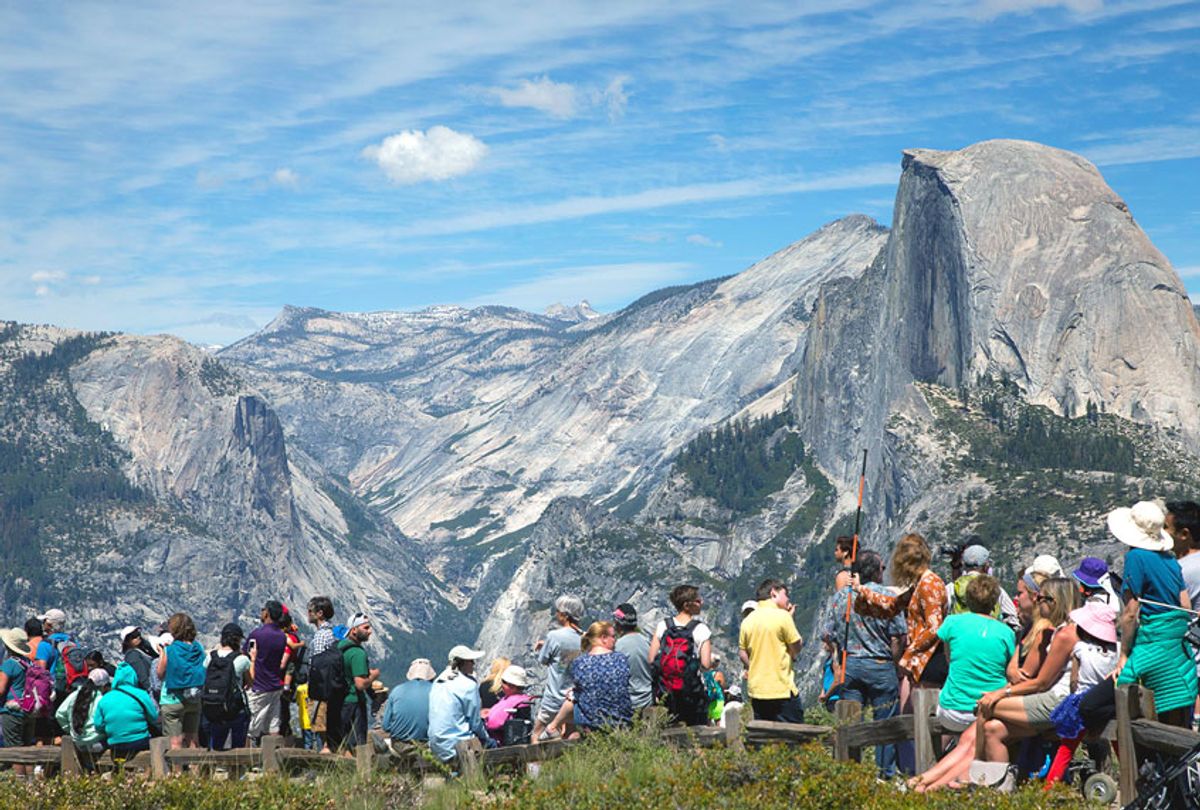 People wait for the trailhead at Glacier Point for a hike from the mountain at Yosemite National Park, Calif. (AP Photo/Jacquelyn Martin)