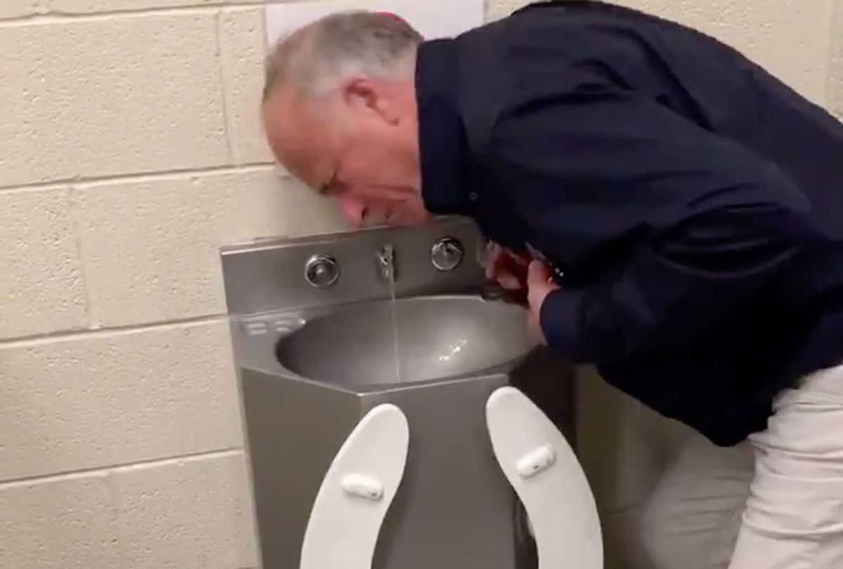 Iowa Representative Steve King, drinking from a toilet fountain at a detention center (Twitter/Steve King)