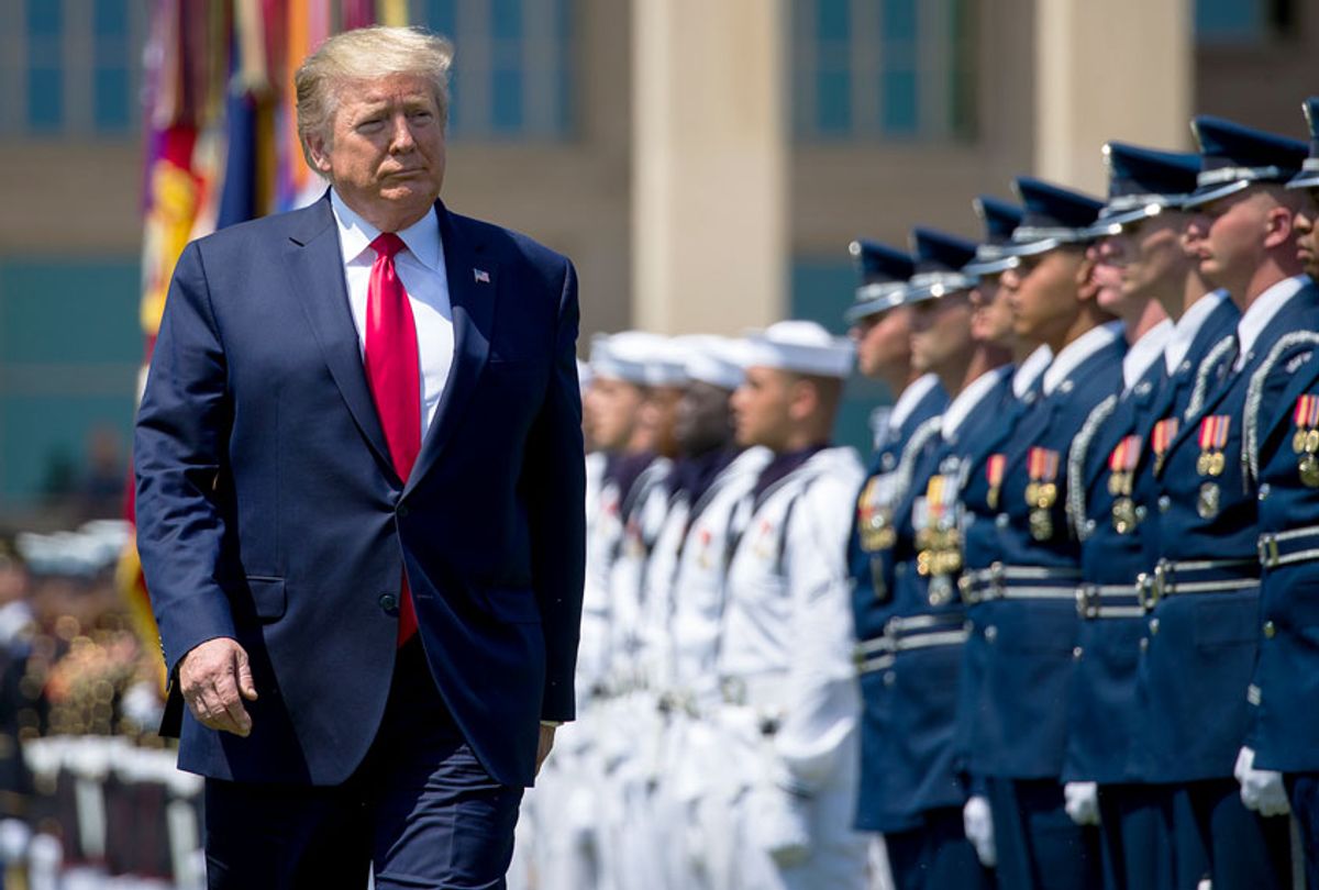 President Donald Trump reviews the troops during a full honors welcoming ceremony for Secretary of Defense Mark Esper at the Pentagon, Thursday, July 25, 2019, in Washington. (AP Photo/Alex Brandon)