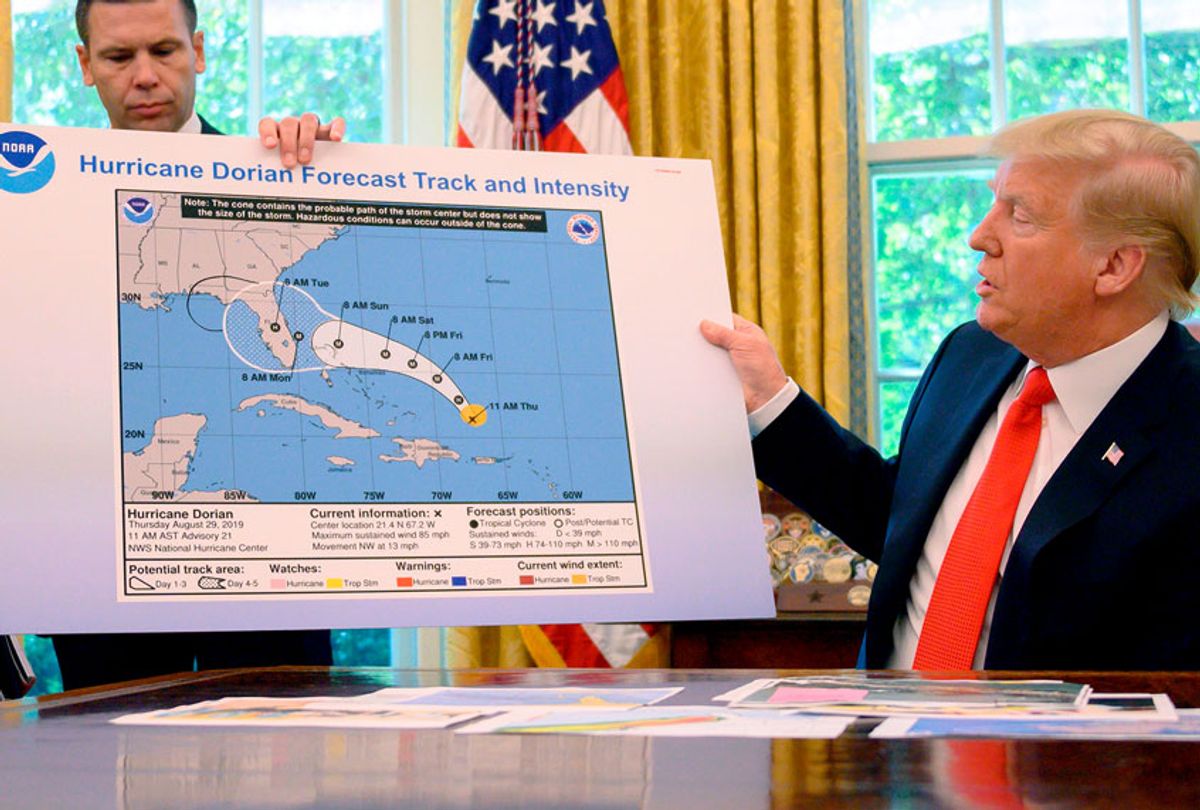 US President Donald Trump and Acting US Secretary of Homeland Security Kevin McAleenan update the media on Hurricane Dorian preparedness from the Oval Office at the White House in Washington, DC, September 4, 2019. (JIM WATSON/AFP/Getty Images)