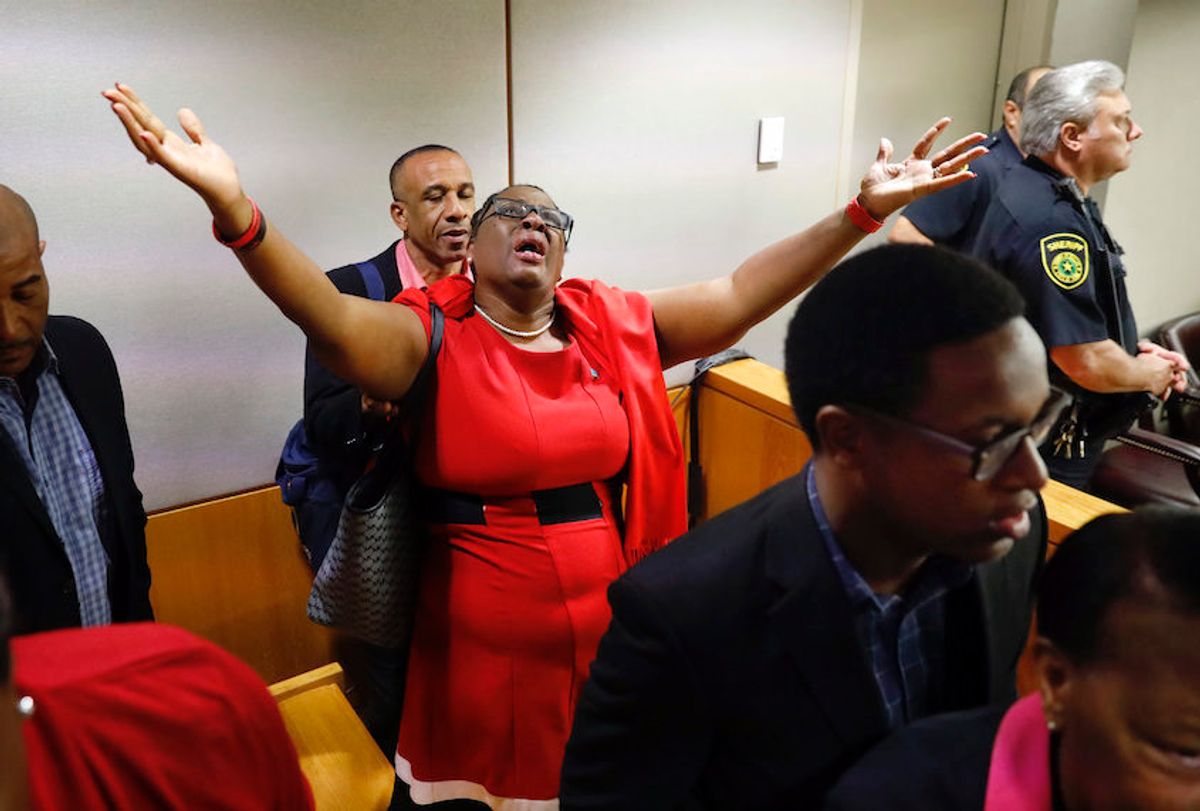 Botham Jean’s mother, Allison Jean, rejoices in the courtroom after fired Dallas police Officer Amber Guyger was found guilty of murder. (AP/Tom Fox/The Dallas Morning News/Pool)