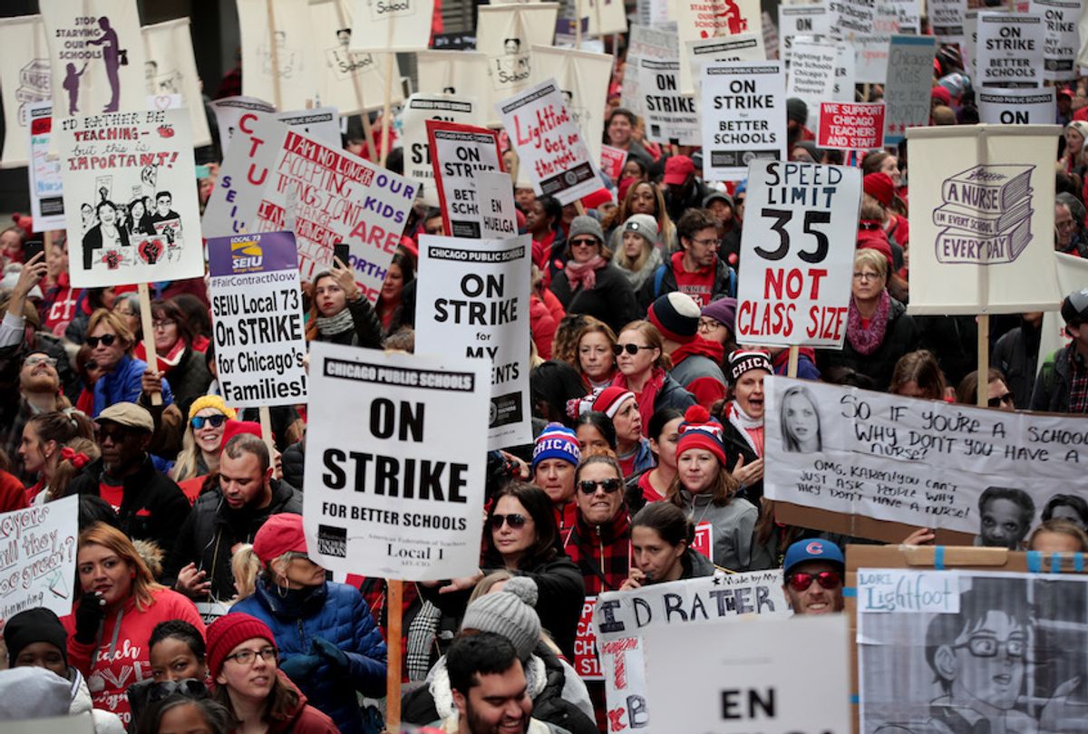 Striking Chicago public school teachers and their supporters march through the Loop on October 17, 2019 in Chicago, Illinois.  (Scott Olson/Getty Images)