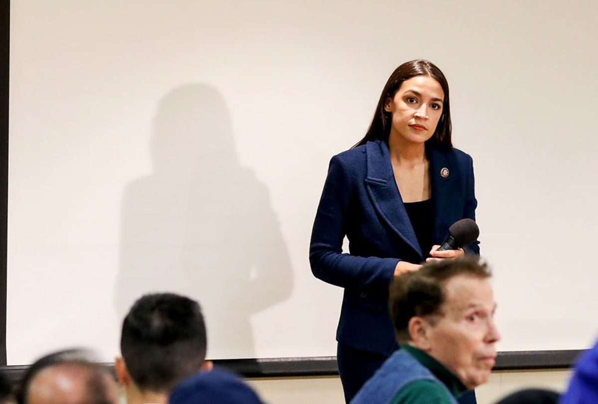 U.S. Rep. Alexandria Ocasio-Cortez (D-NY) takes questions during a town hall meeting at the LeFrak City Queens Library on October 3, 2019 in the Queens borough of New York City. The event focused on her A Just Society legislation, which targets poverty, affordable housing, and access to federal benefits.  (Drew Angerer/Getty Images)