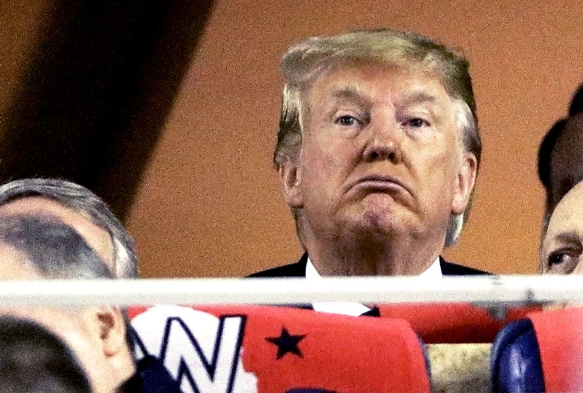  Donald Trump attends Game Five of the 2019 World Series between the Houston Astros and the Washington Nationals at Nationals Park on October 27, 2019 in Washington, DC. (Photo by  (Patrick Smith/Getty Images)