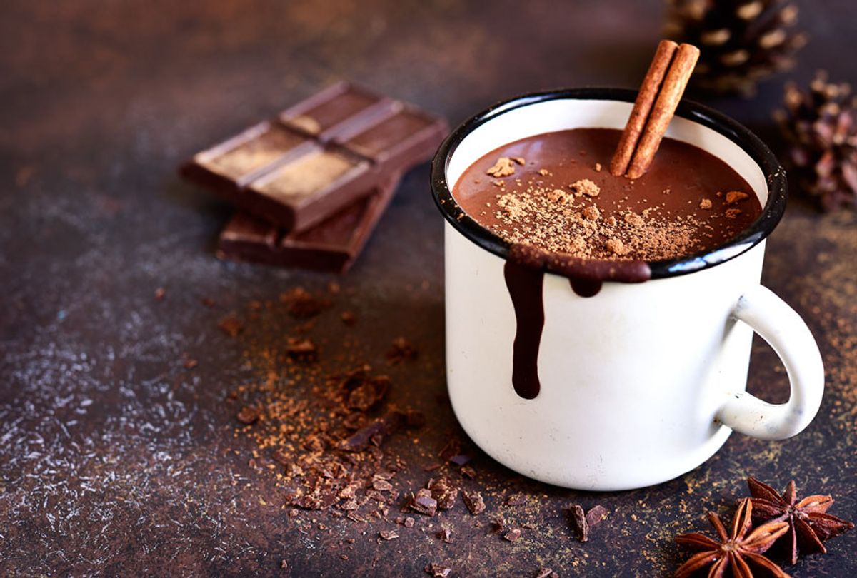 Homemade hot chocolate with cinnamon in enamel mug (Getty Images)