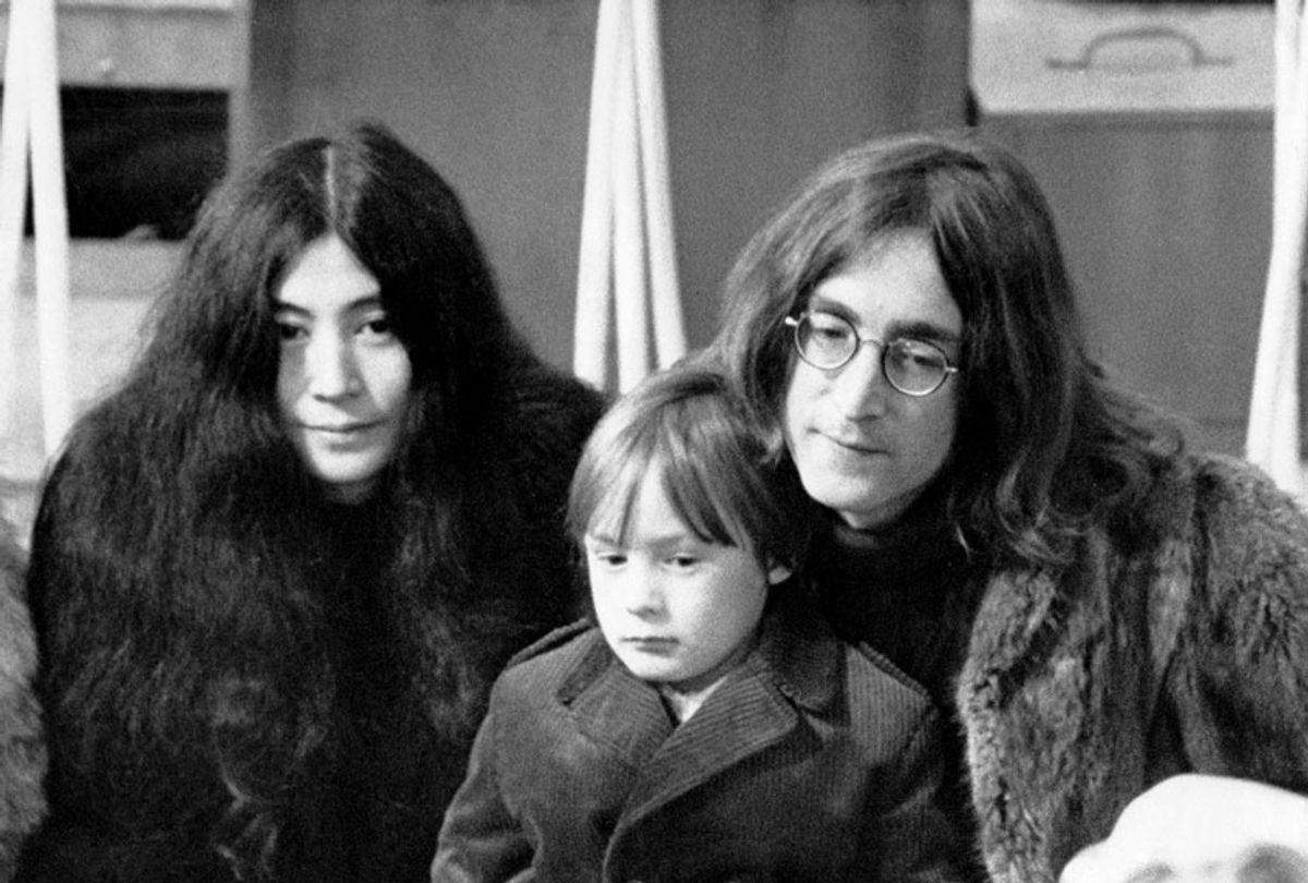John Lennon (1940 - 1980), his son Julian and Yoko Ono pose for photographers at Internel Studios in Stonebridge Park, Wembley, during a rehearsal for the Rolling Stones' 'Rock and Roll Circus' TV special, London, 10th December 1968. (Photo by Daily Express/Hulton Archive/Getty Images)