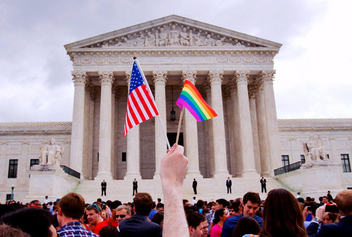 In this June 26, 2015 file photo, a crowd celebrates outside of the Supreme Court in Washington after the court declared that same-sex couples have a right to marry anywhere in the U.S. (AP Photo/Jacquelyn Martin)