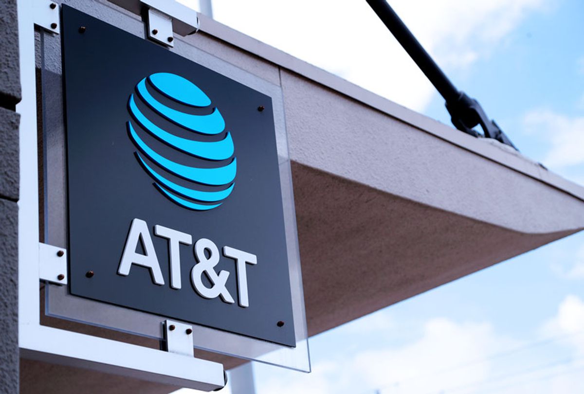A sign is displayed at an AT&T retail store (AP Photo/Lynne Sladky)