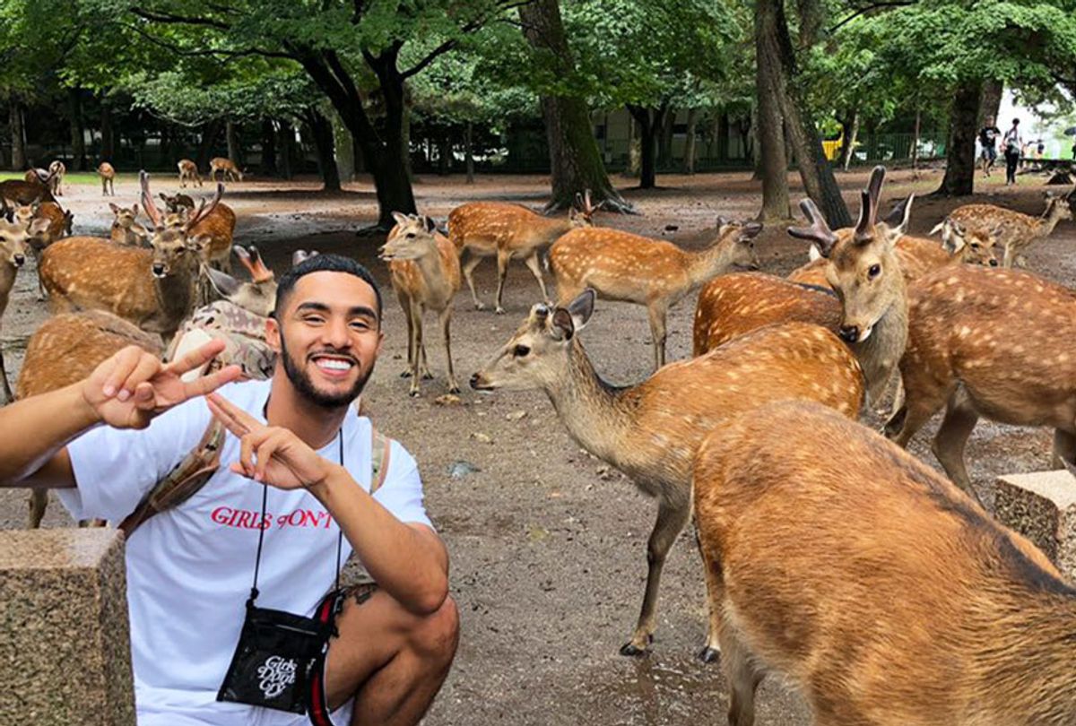 Kelvin Peña, also known as "Brother Nature," posing with dear. (Twitter/@BrotherNature)
