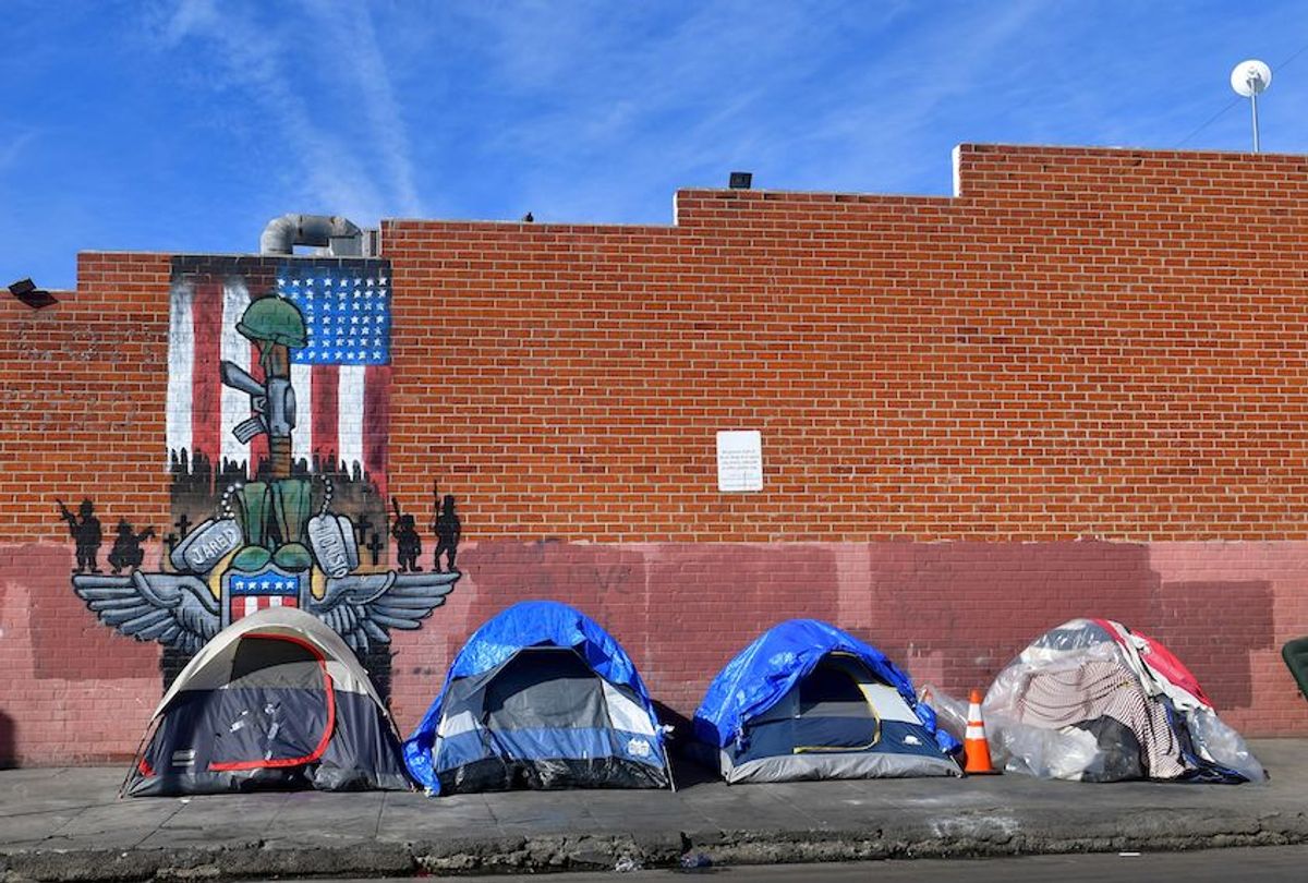 Tents for the homeless line a sidewalk in Los Angeles, California on December 17, 2019. (Frederic J. Brown/AFP via Getty Images)