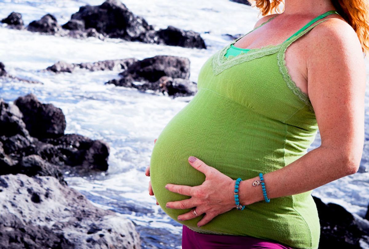 Pregnant Woman By The Sea (Getty Images/iStock)