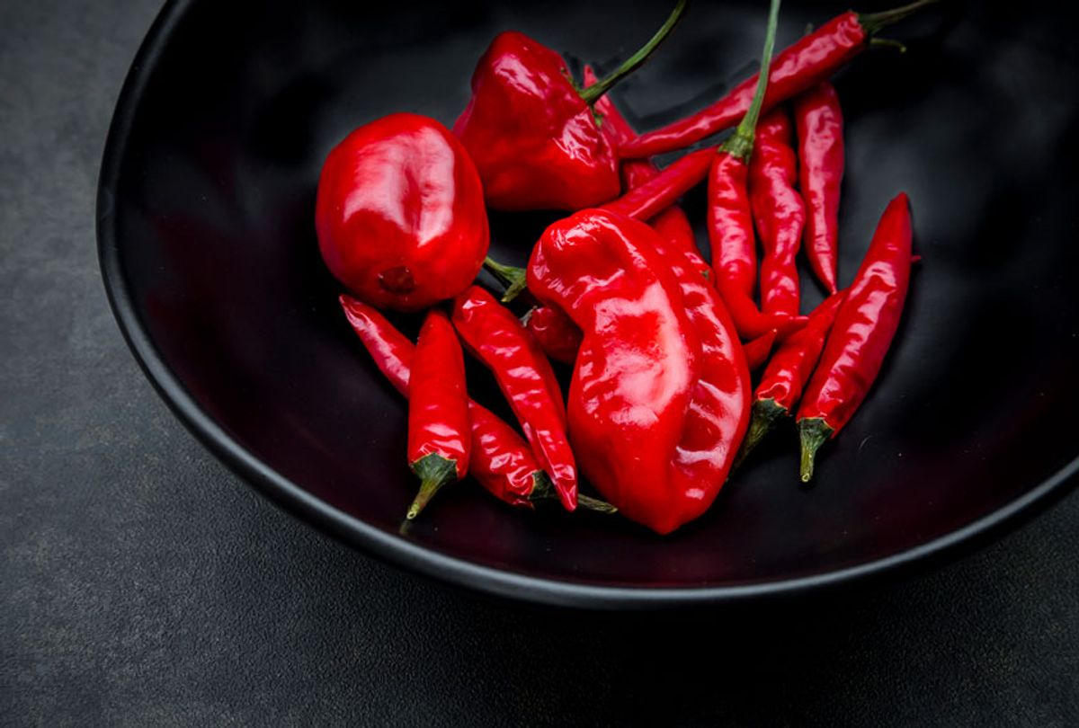 Black bowl of various red chili peppers (Getty Images)