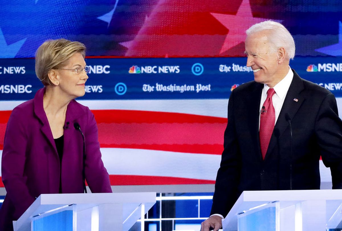 Sen. Elizabeth Warren (D-MA) (L) and former Vice President Joe Biden smile at each other during the Democratic Presidential Debate (Alex Wong/Getty Images)