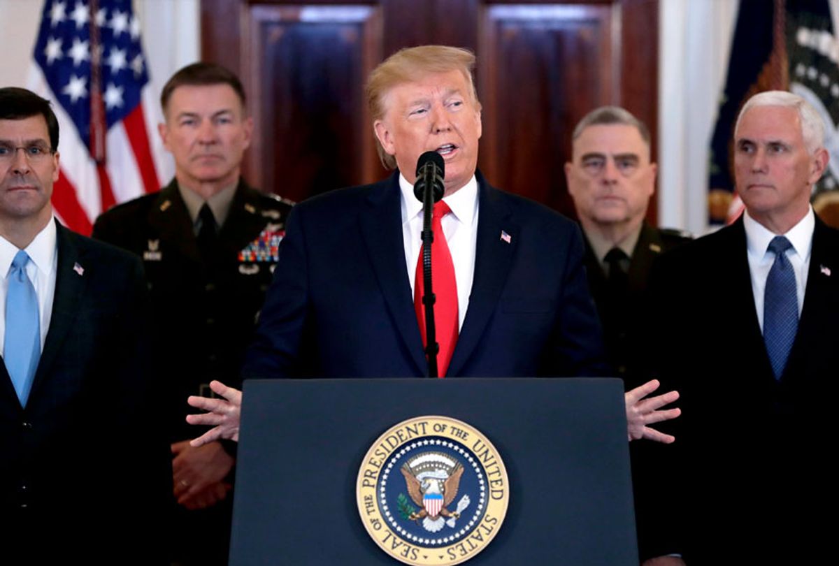 President Donald Trump addresses the nation from the White House on the ballistic missile strike that Iran launched against Iraqi air bases housing U.S. troops, Wednesday, Jan. 8, 2020, in Washington, as Vice President Mike Pence and others looks on.  (AP Photo/ Evan Vucci)