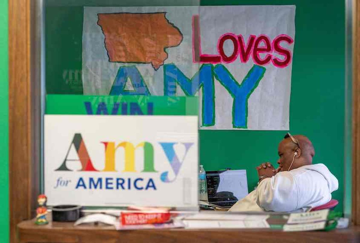 Democratic presidential hopeful Minnesota Senator Amy Klobuchar staffer Seth Barnes makes calls to potential voters at an office being used as storage at the Des Moines, Iowa campaign headquarters on January 29, 2020. (Kerem Yucel/AFP via Getty Images)
