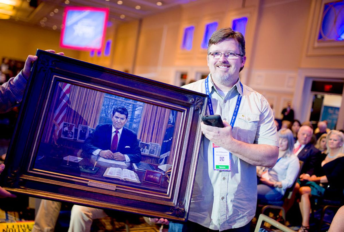 Painter Jon McNaughton shows off a portrait of President Reagan at a taping of Sean Hannity's Fox News TV show during the Conservative Political Action Conference at the Gaylord National Resort and Convention Center February 23, 2017 in National Harbor, Maryland. Hosted by the American Conservative Union, CPAC is an annual gathering of right wing politicians, commentators and their supporters.  (Zach D Roberts/NurPhoto via Getty Images)