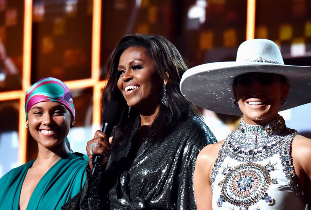 Alicia Keys, Michelle Obama and Jennifer Lopez speak onstage during the 61st Annual GRAMMY Awards at Staples Center on February 10, 2019 in Los Angeles, California. (Lester Cohen/Getty Images for The Recording Academy)