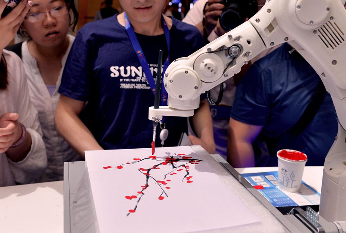 People watch an intelligent robot painting during the opening of the 3rd World Intelligence Congress (WIC) at the Meijiang Convention & Exhibition Center on May 16, 2019 in Tianjin, China. The 3rd WIC with the theme of 'Intelligence New Era: Progress, Planning and Opportunity' is held on May 16-19 in Tianjin.  (Visual China Group via Getty Images)