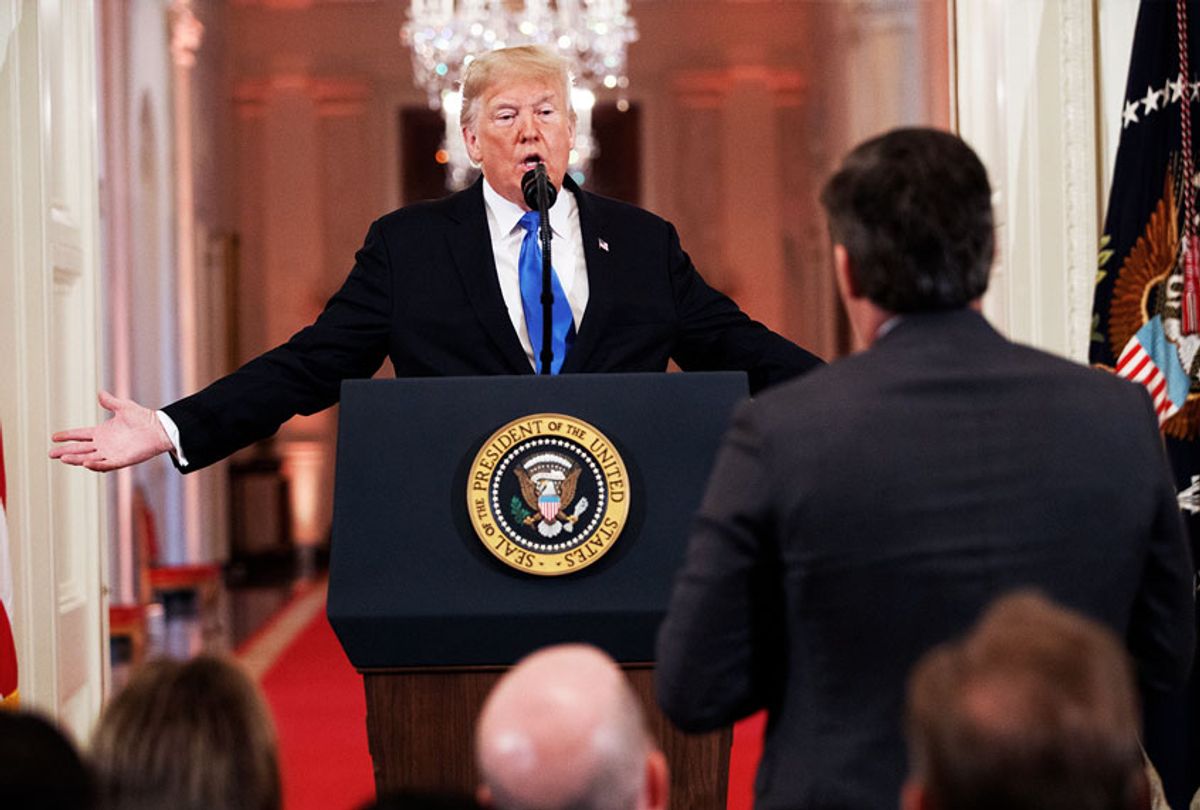 U.S. President Donald Trump gets into an exchange with Jim Acosta of CNN after giving remarks a day after the midterm elections on November 7, 2018 in the East Room of the White House in Washington, DC. (AP Photo/Evan Vucci)