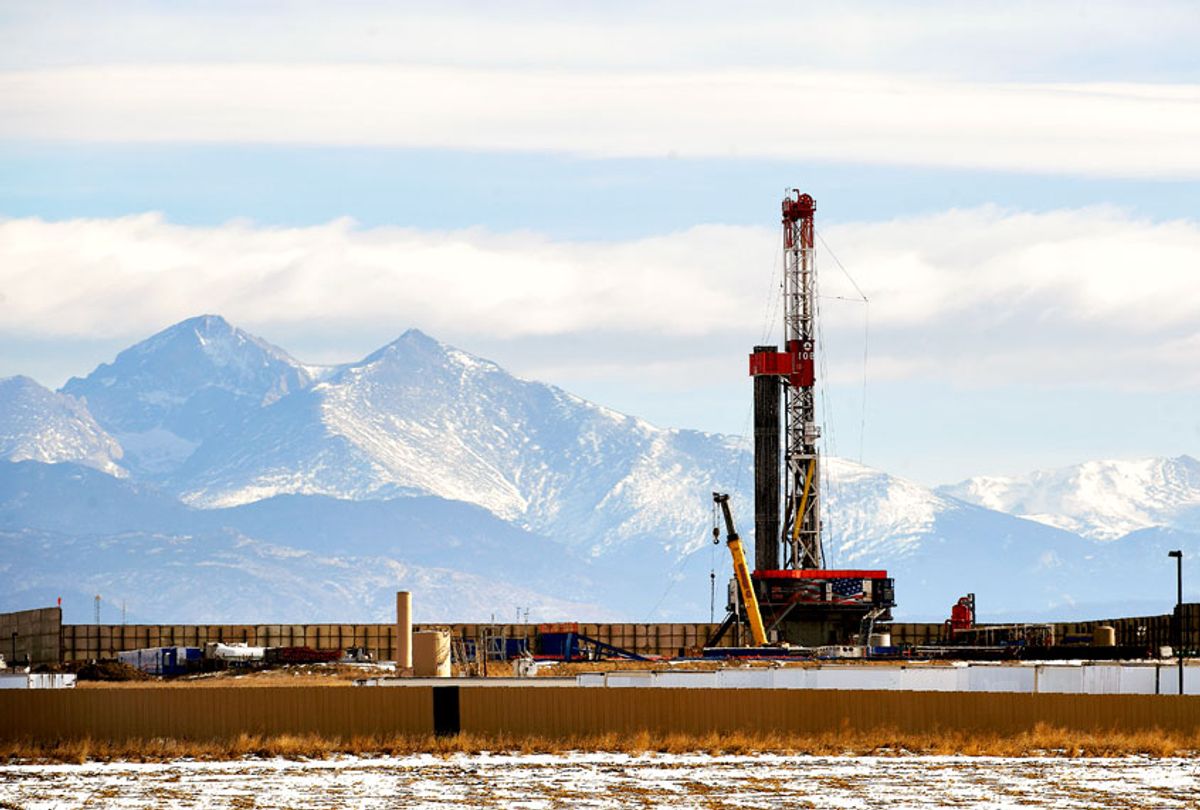 A large fracking operation becomes a new part of the horizon with Mount Meeker and Longs Peak looming in the background. (Helen H. Richardson/The Denver Post via Getty Images)